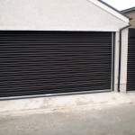 garage with black door